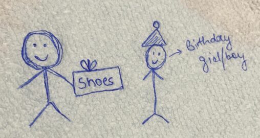 here is me giving shoes as gift to someone.